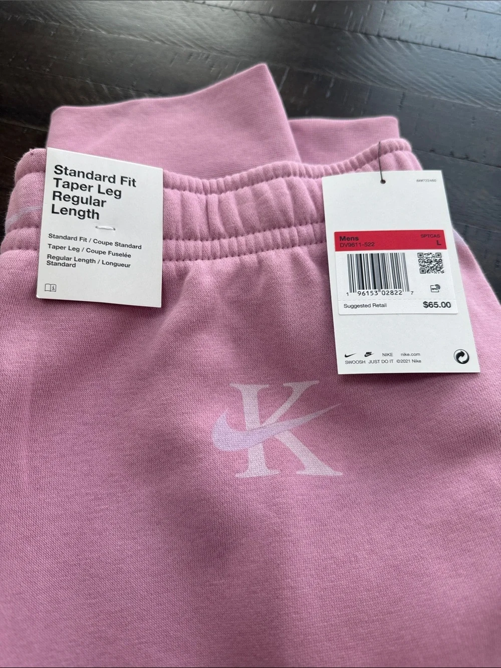 NWT Nike Men’s Pink Tapered Joggers with Subtle Logo